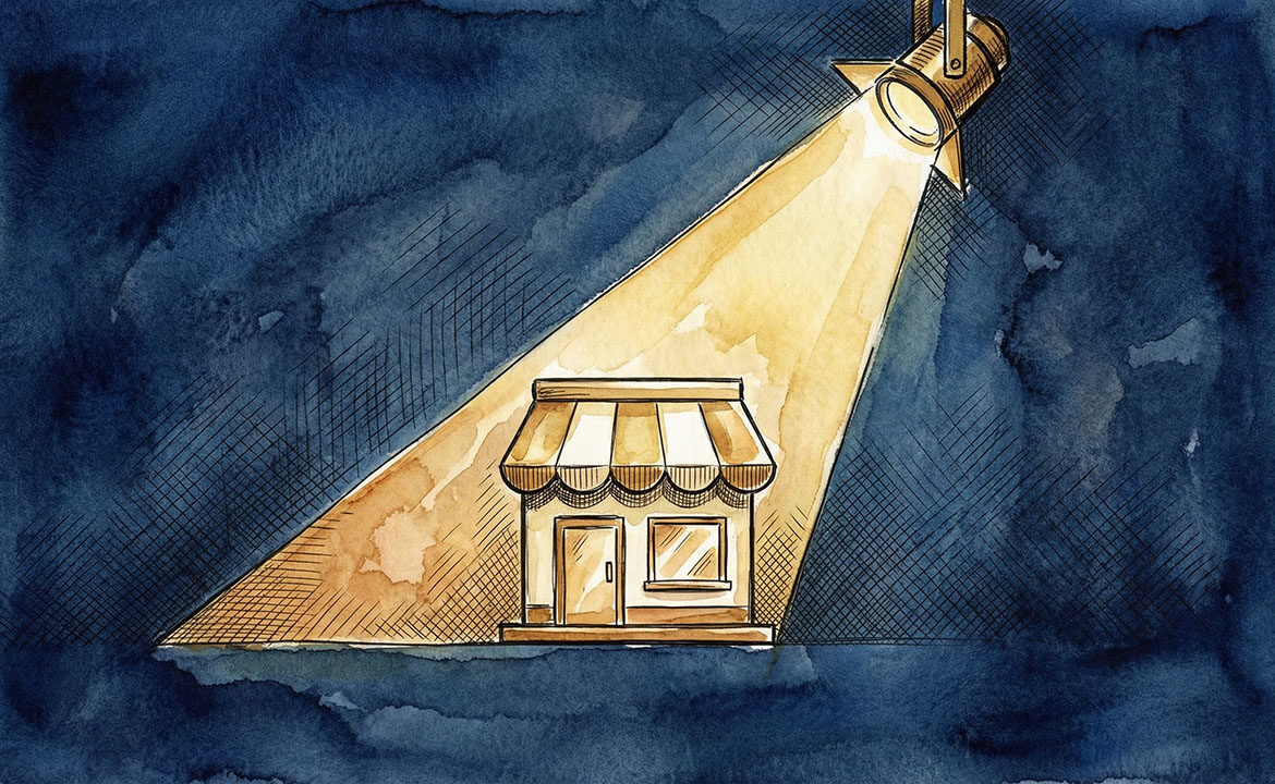 A theatrical spotlight illuminates a small business storefront, representing the idea of engineering a press-worthy moment rather than waiting to be discovered.